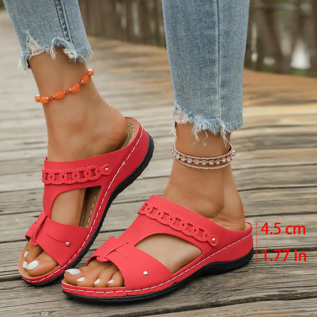 Roman style slope heel slippers with fish mouth toe design in PU leather and rubber sole