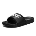 Men's large size open toe slippers with black viscose upper and rubber sole, shown on a white background.