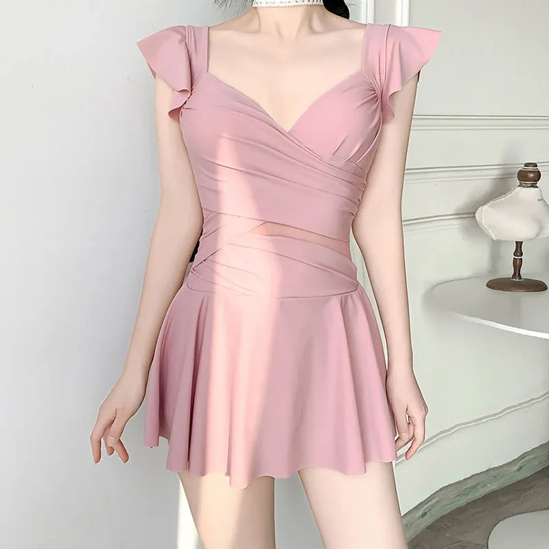 Women's one-piece solid colour French swimsuit in milk silk fabric, available in black, green, and pink, sizes S-XL