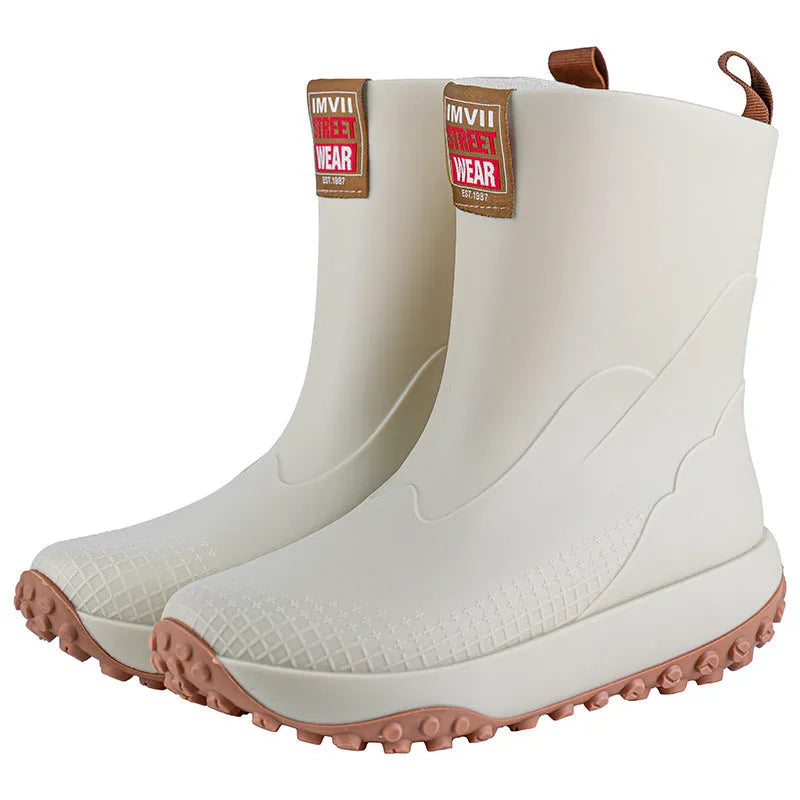 Men's mid low tube rain boots with non-slip sole and PVC upper in black