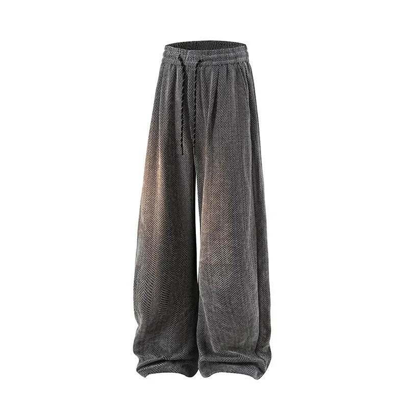 Light grey fleece-lined straight-leg trousers with hollow-out design and elastic waistband.