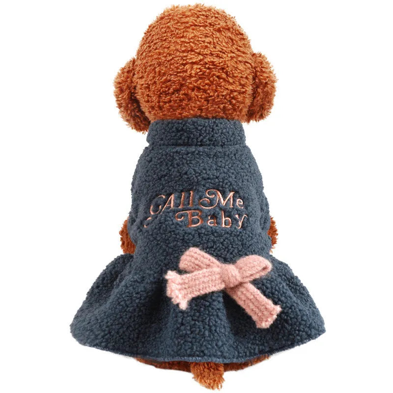 Pet clothing warm Berber fleece skirt in dark blue with letter print on a standing dog.