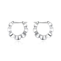 Sterling silver geometric hoop earrings with electroplated finish and circular retro design