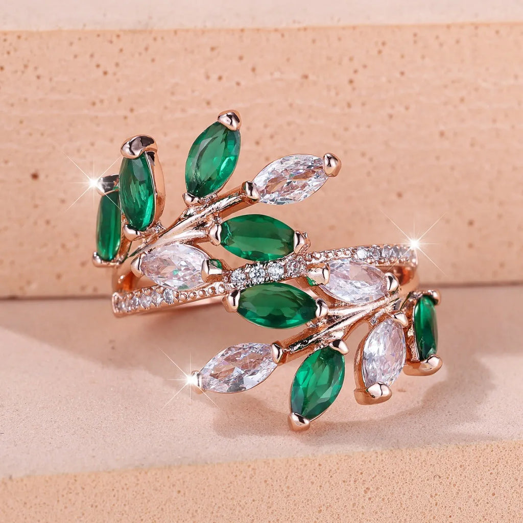 Adjustable copper leaf ring with zircon stones in various colour settings including platinum and rose gold options