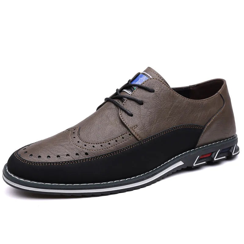 Men's black leather casual shoes with a low top, rubber sole, and sewing line detail on a fabric upper.