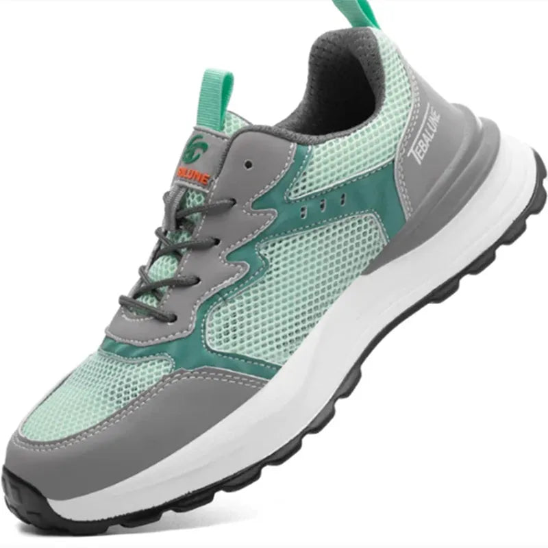 Green low-top anti-smash work shoes with plastic toe cap and mesh upper