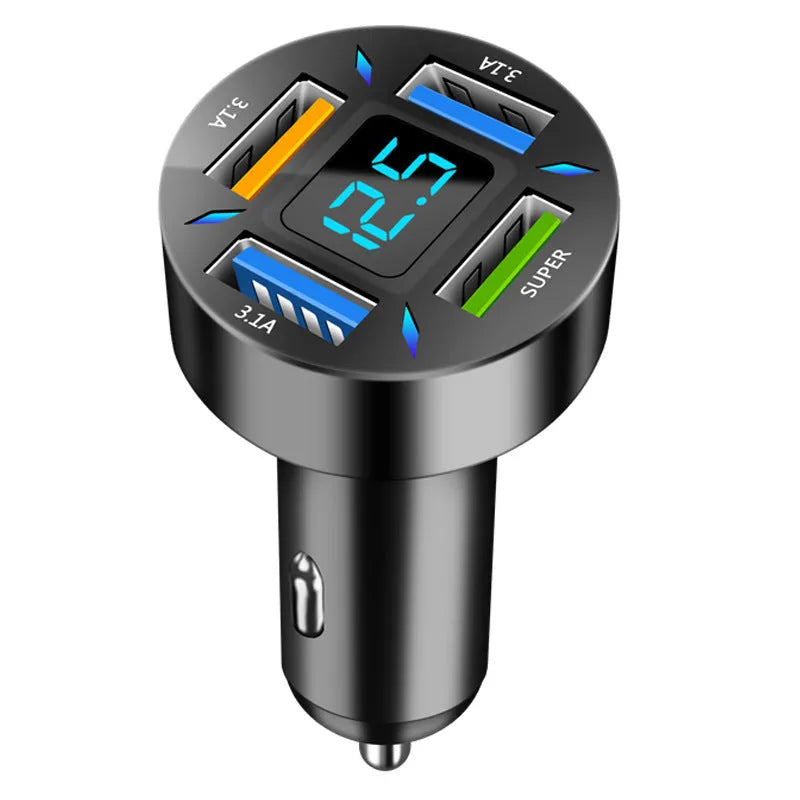 Black four-port USB car charger with digital display, plugged into a car 12V socket.