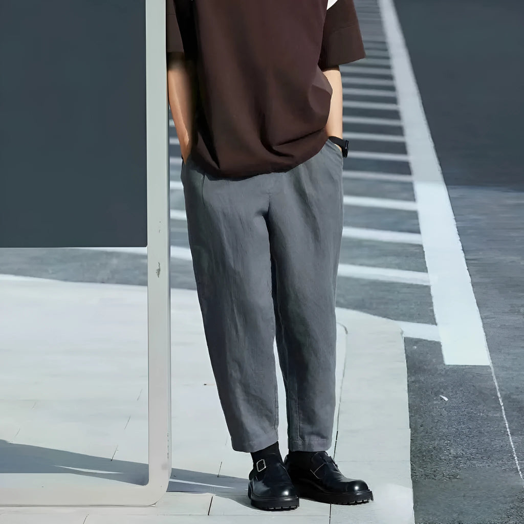 Men's loose straight-leg casual trousers in thin fabric with drawstring waist, shown in multiple colour options