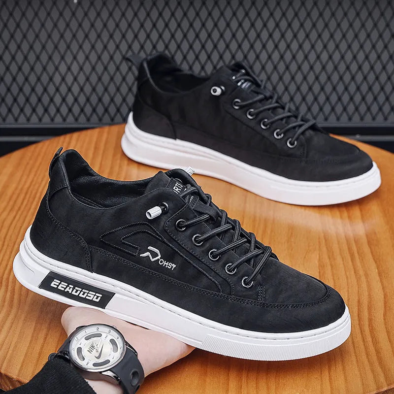 Men's grey casual shoes with canvas upper, leather lining, rubber sole, low-top, and lace-up front
