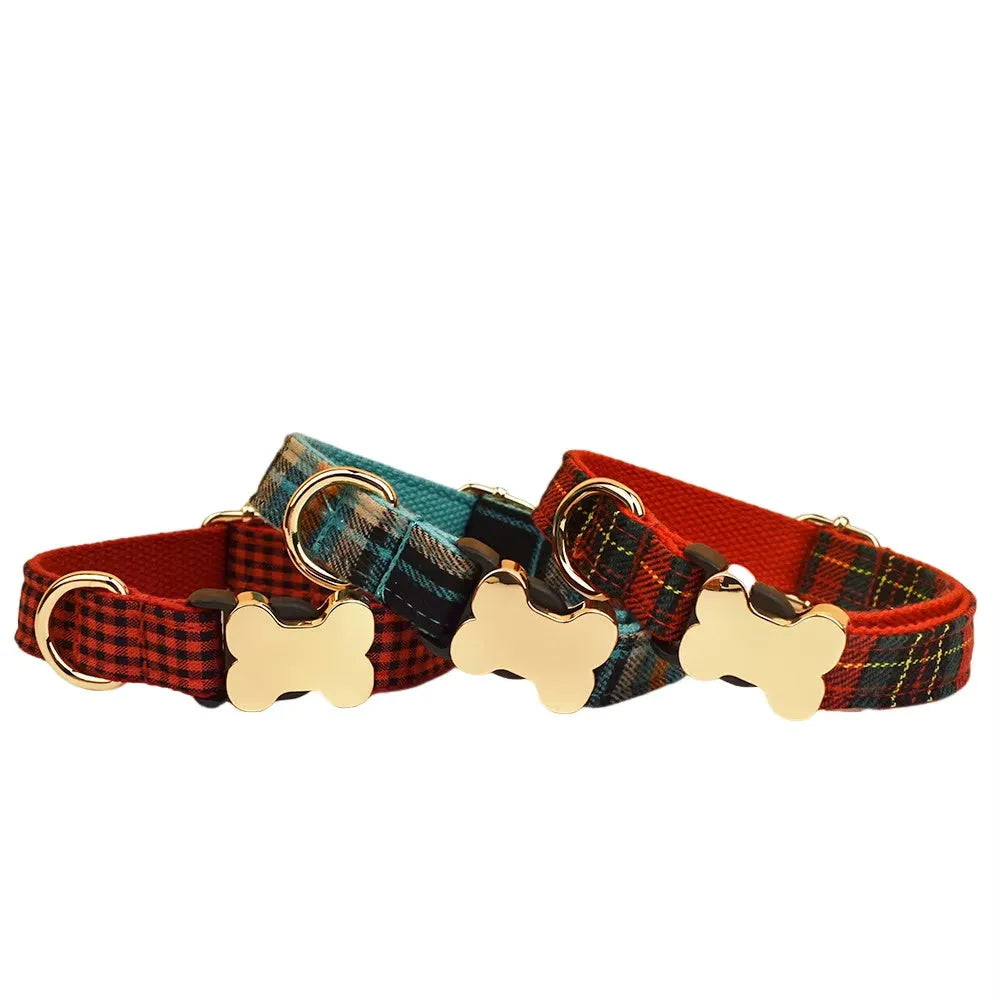 Flat nylon dog collar with grid print and a bone-shaped buckle in one of six available colours.
