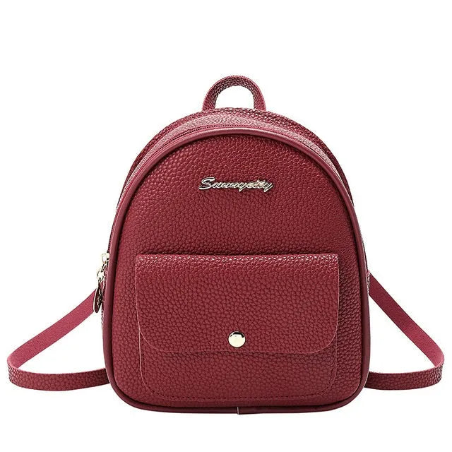 Black PU leather small women's backpack with zipper, shown as a shoulder bag