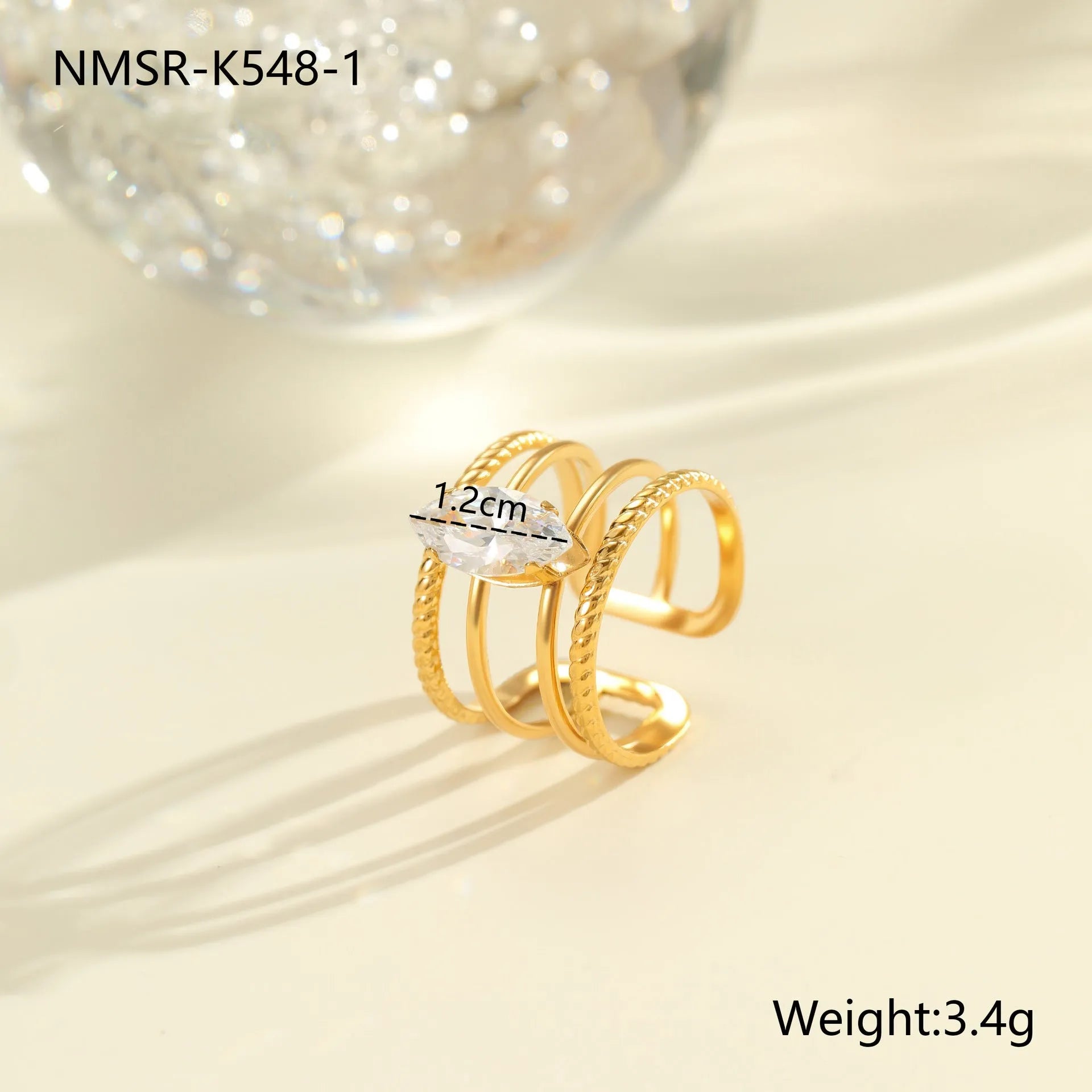 Women's gold stainless steel ring with zircon details on heart and drop shapes