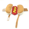 Funny hot dog costume suit on a small dog for pet cosplay and winter clothing.