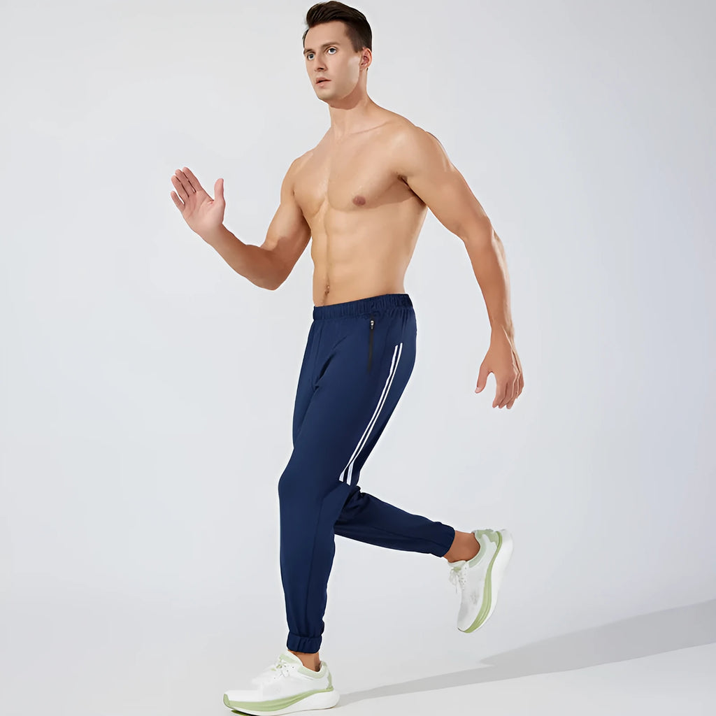 Men's black running trousers with polyester fabric and mid waist design for exercise