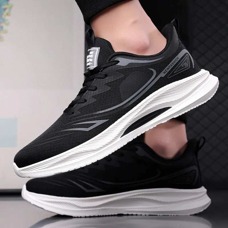 Men's low-top casual trainer in grey-green with woven mesh upper and round toe on a rubber sole.