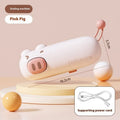 Mini rechargeable bag sealer in coffee bear design sealing a plastic snack bag on a table