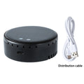 Black solar-powered car air humidifier mounted on a car air vent