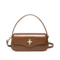 Genuine leather baguette handbag in black with clamshell opening and lock detail