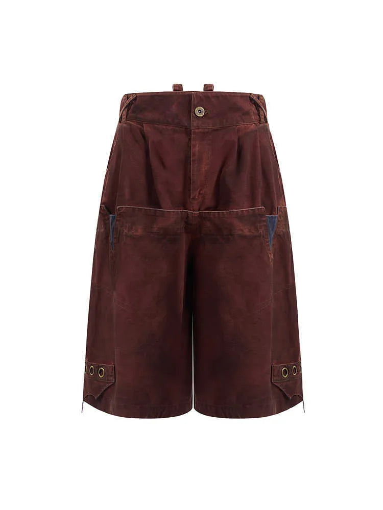 Men's double waist loose cropped pants in black with washed stitching, front view