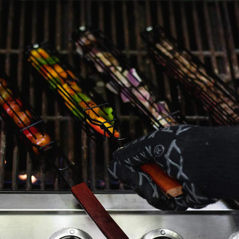 BBQ grill mesh basket with wood handle and rotary lid on outdoor grill