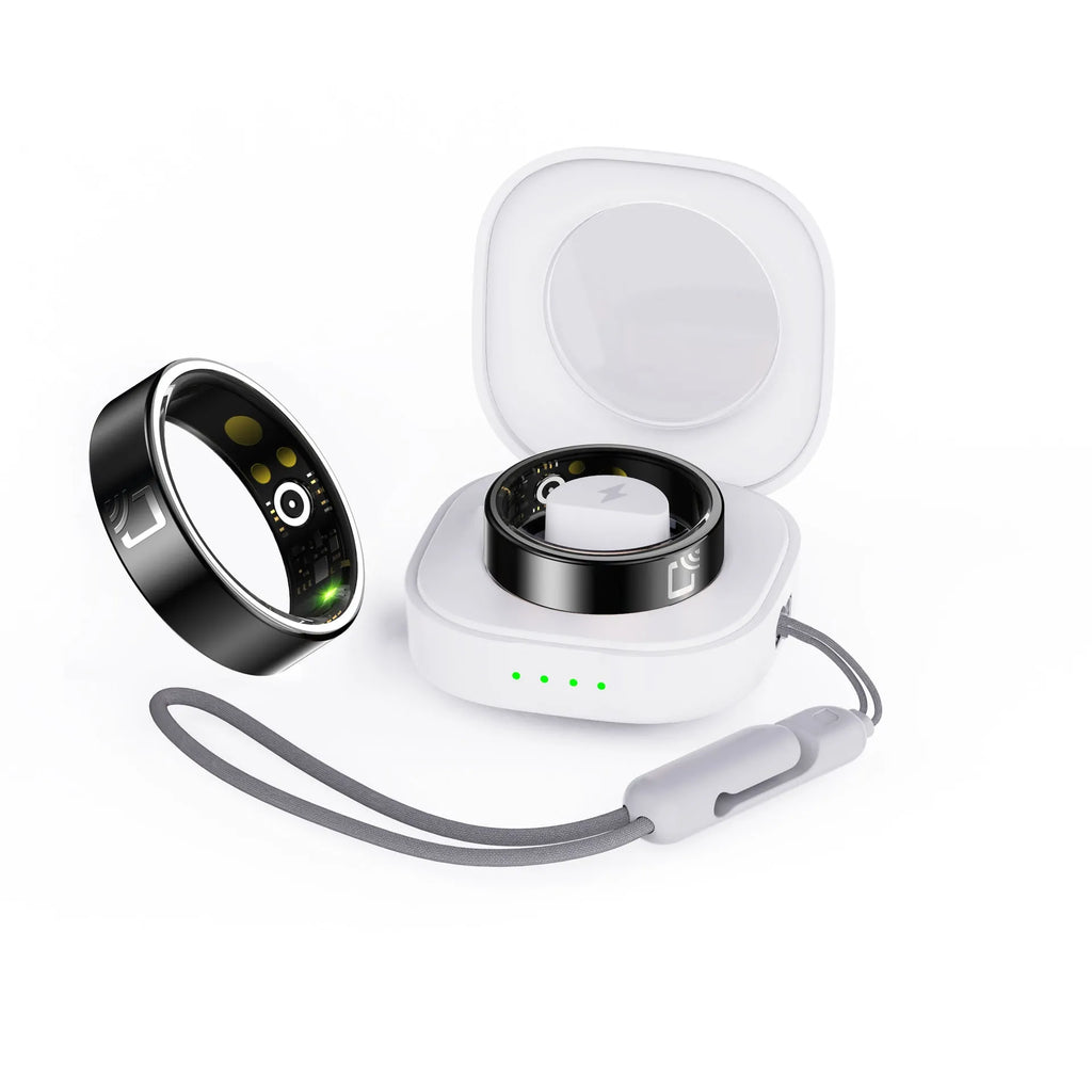 Black ceramic smart ring for health monitoring on a finger next to its charging case.