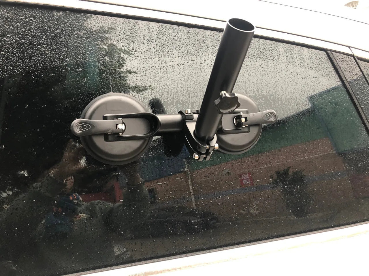 Black off-road car flagpole sucker base with round rubber suction cup and ABS plastic body.