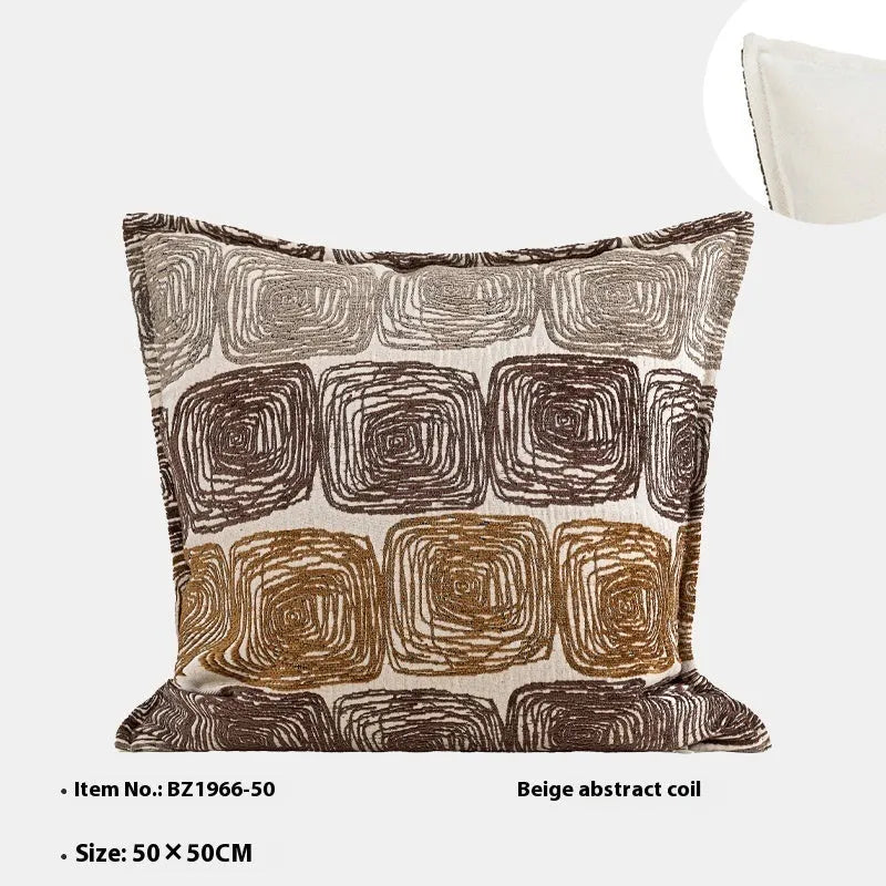 Abstract coil pattern pillow cover in cream and coffee colours with feather velvet texture