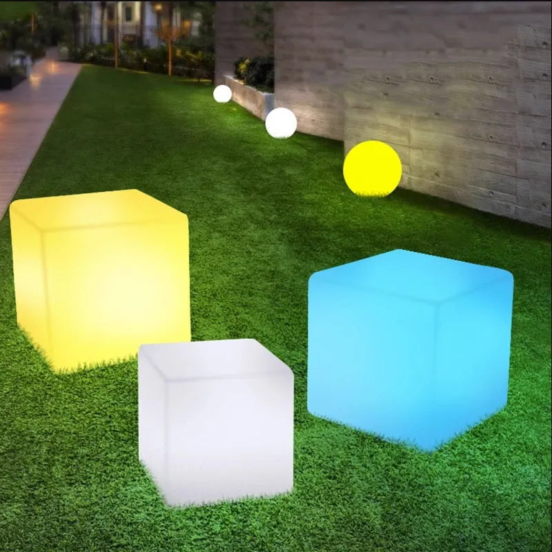 Square LED cube stool light with modern design for outdoor seating and illumination