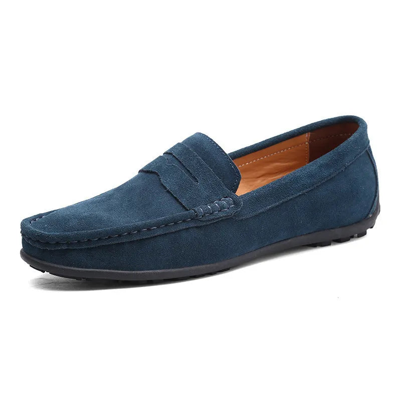 Men's suede Gommino loafers in brown with a round toe and flat rubber sole
