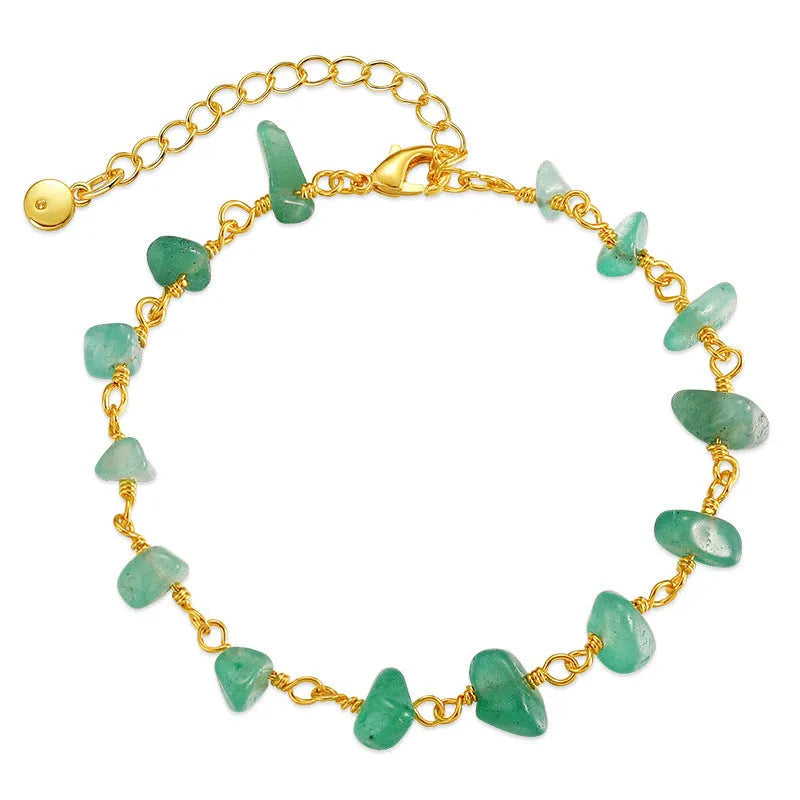 Women's irregular natural gravel turquoise bracelet in 18K copper with geometric design and crystal accents