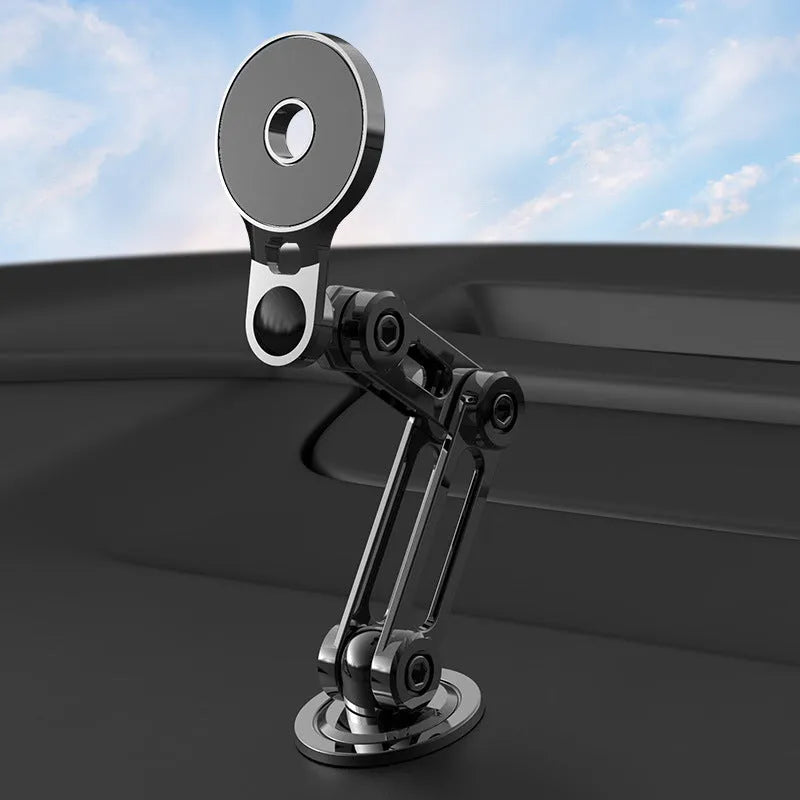 Black magnetic car phone holder mounted on air vent with smartphone attached