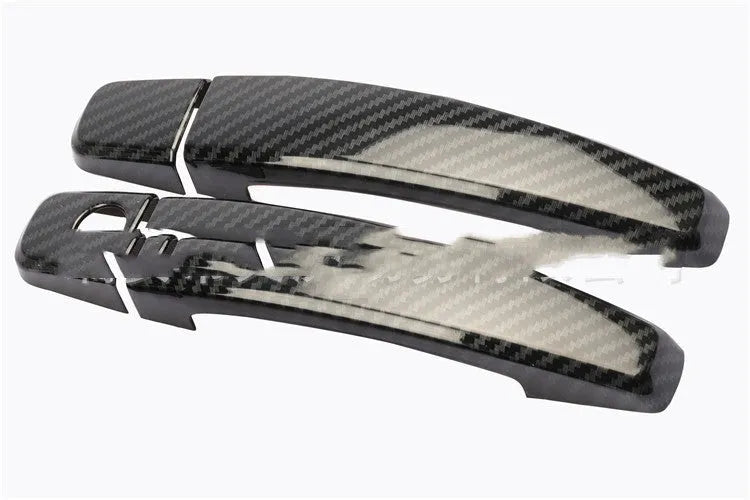 Carbon fibre pattern ABS door handle cover for Opel Vauxhall Astra H/J models.