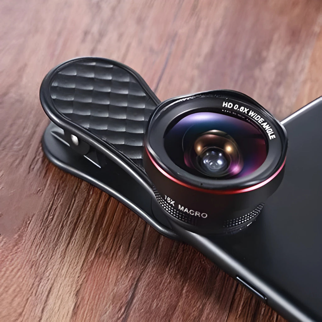 Black LQ-046 smartphone wide-angle and macro lens kit with clip and storage case on a table.