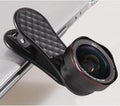 Black LQ-046 smartphone wide-angle and macro lens kit with clip and storage case on a table.