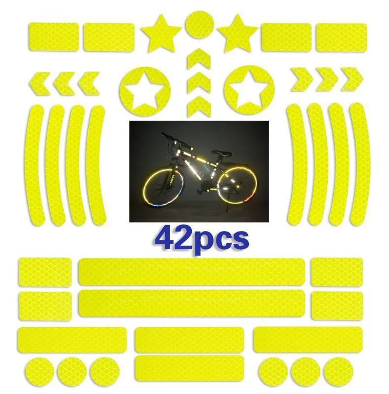 Reflective grid pattern safety tape for bicycles in red, yellow, blue, and white colours.