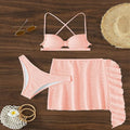 Lace-up bikini three-piece swimsuit for women in light pink, with top, pants, and skirt made of polyester