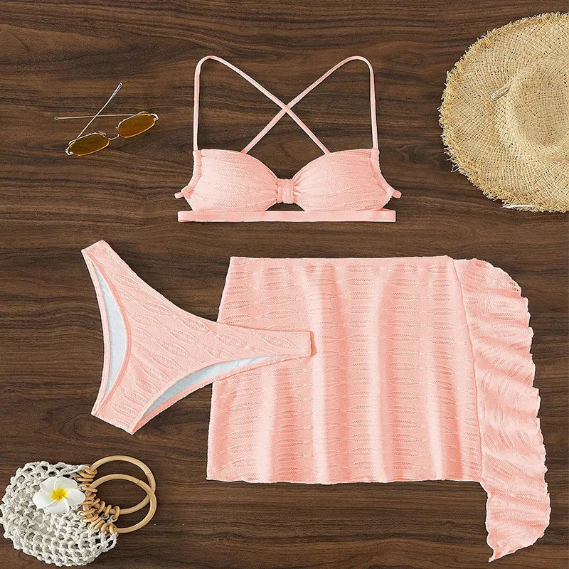 Lace-up bikini three-piece swimsuit for women in light pink, with top, pants, and skirt made of polyester