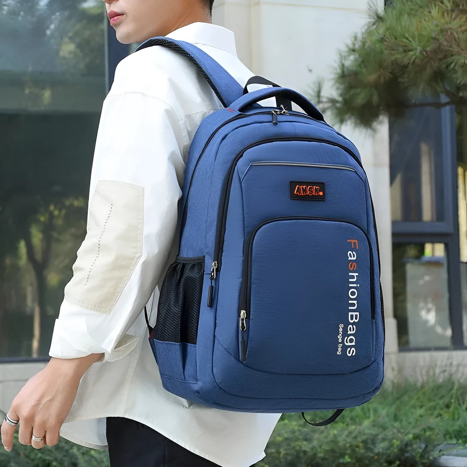 Nylon fashion backpack in street style showing multiple compartments and double shoulder straps.