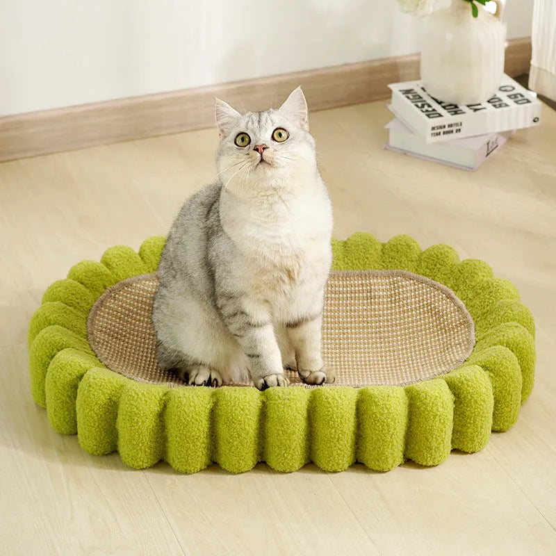 Green oval cat scratch pad bowl measuring 650mm serving as scratching board and cat bed