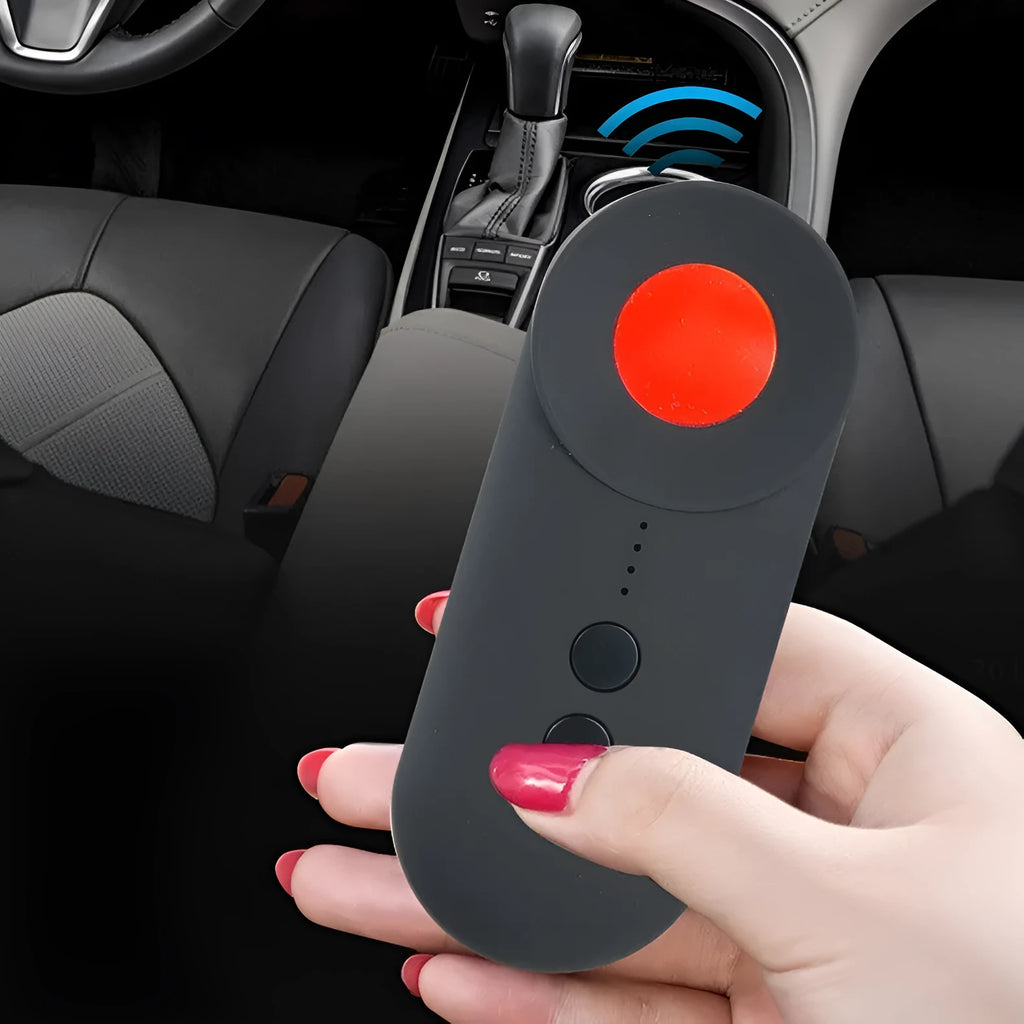 Black handheld GPS and hidden camera detector with USB port on a compact ABS plastic body.