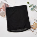 Black mesh postpartum belly band for waist trimming and tummy slimming laid flat.