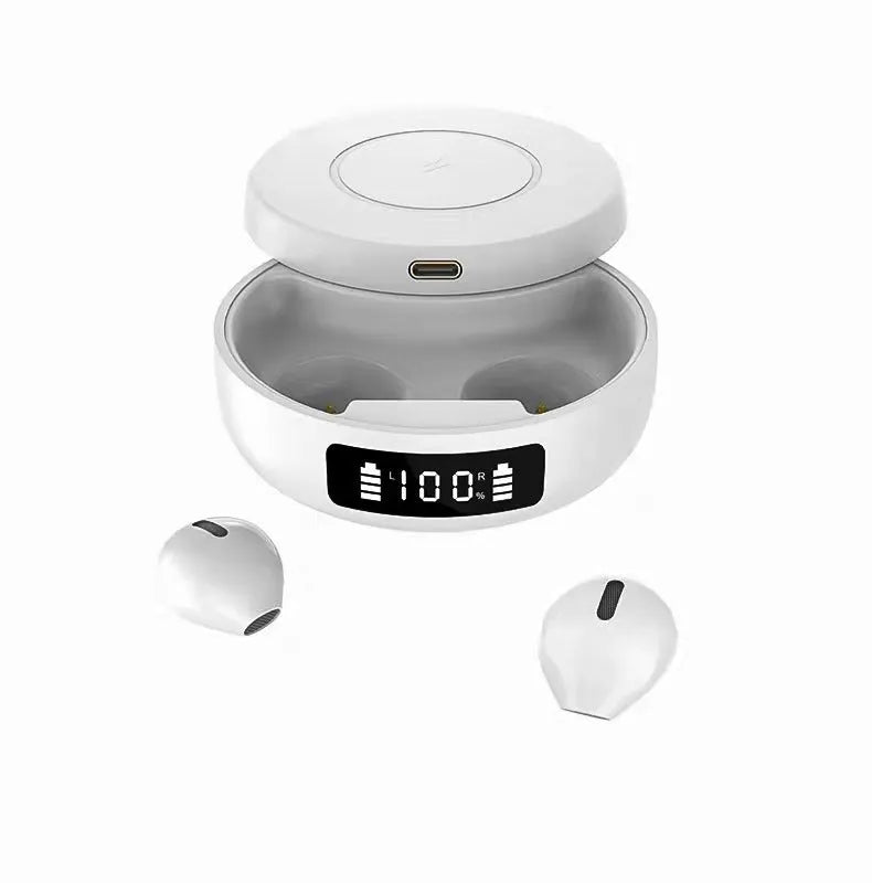 Mini black and white semi-in-ear wireless headphones with their wireless charging compartment.