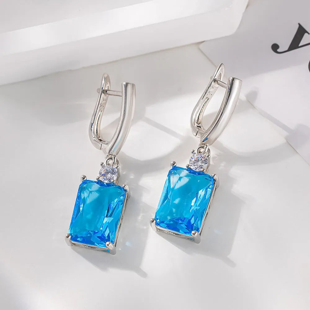 Square geometric earrings with electroplated gold or silver finish on copper