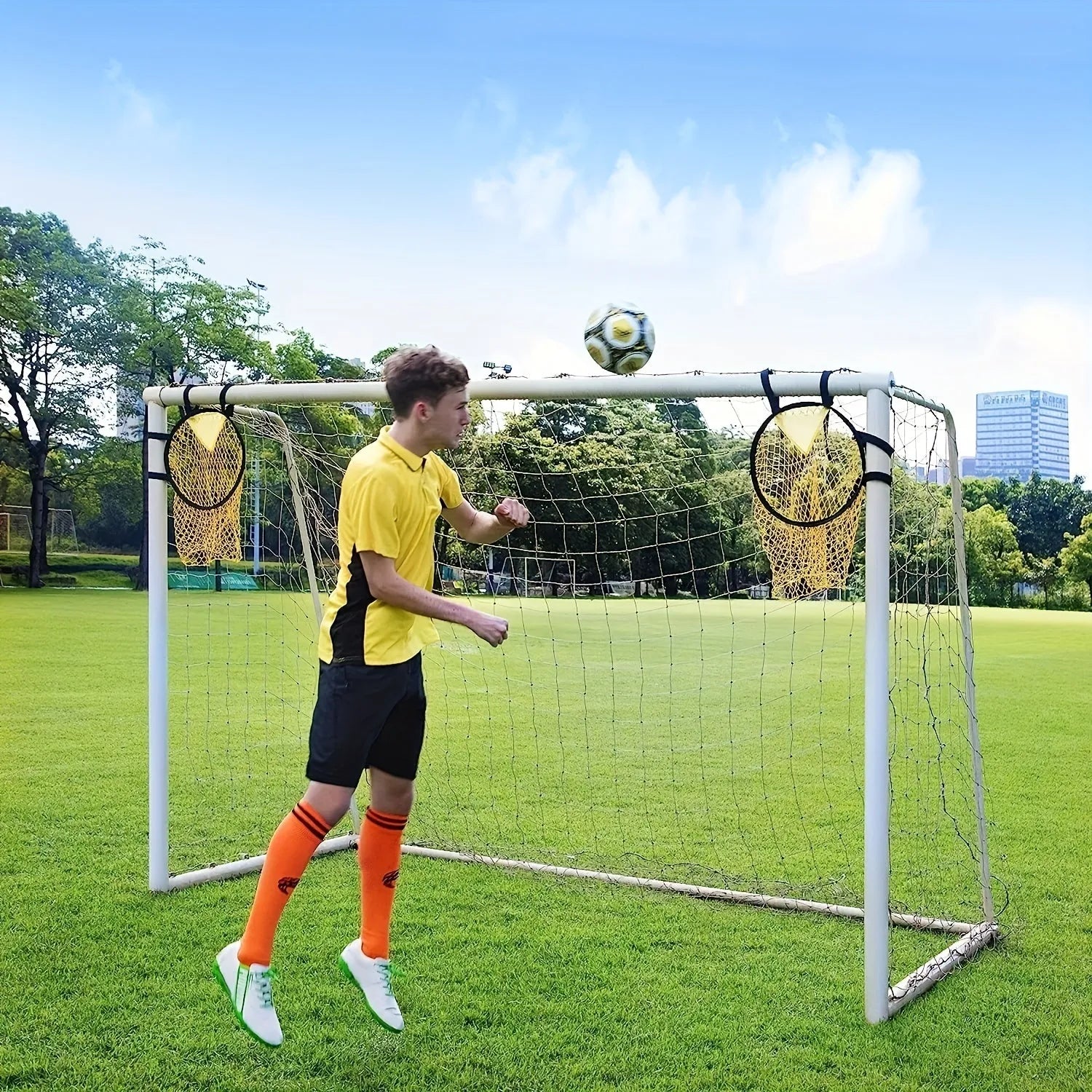 Portable soccer training goal net with aluminium frame in yellow colour option set up for practice