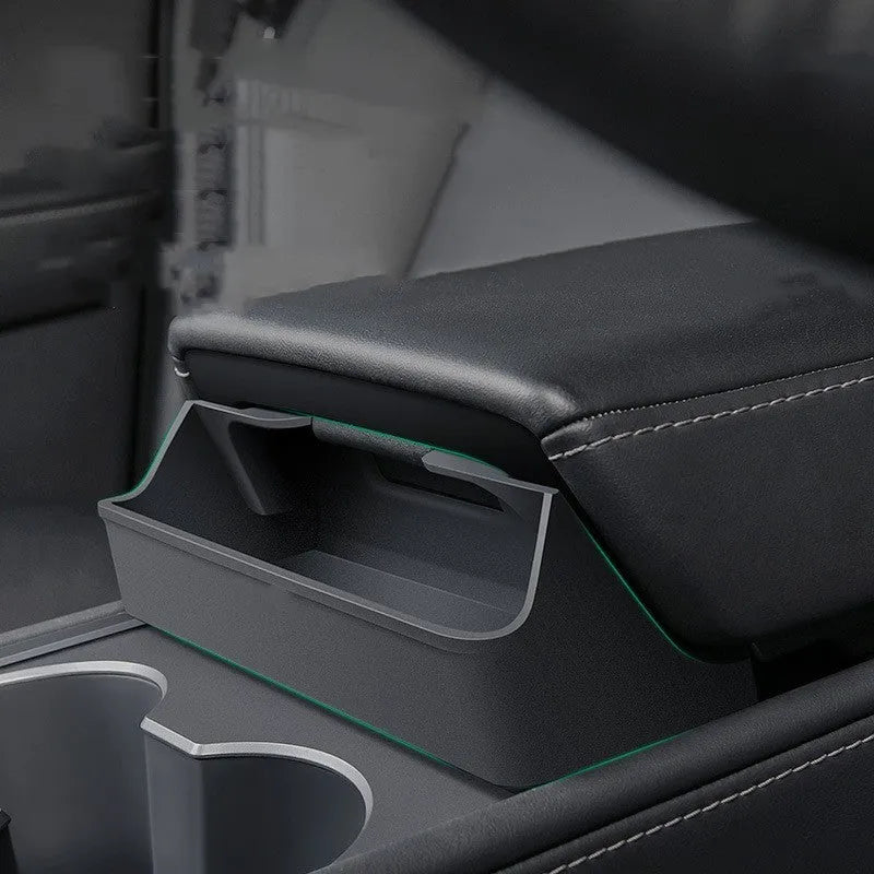 Black silicone car glasses case attached to Tesla Model 3 armrest box for sunglasses storage