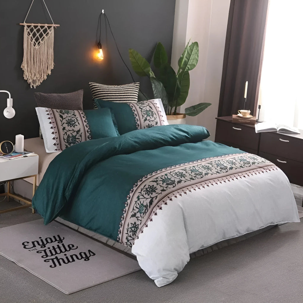 Polyester duvet cover set with plain weave reactive printing in peacock blue colour on a bed