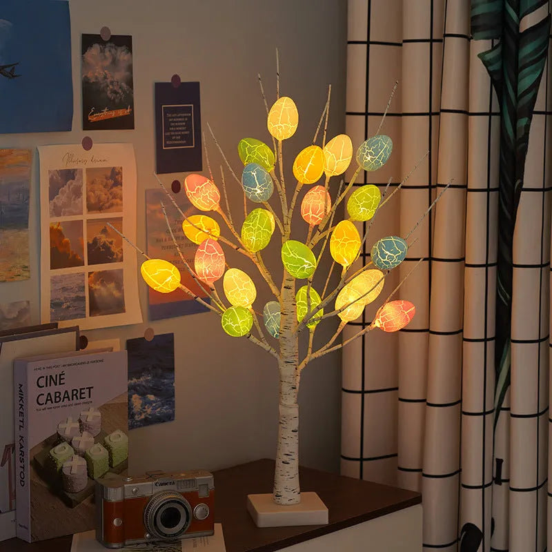 60cm birch-style Easter tree with warm white LED lights and cracked egg ornaments on a tabletop