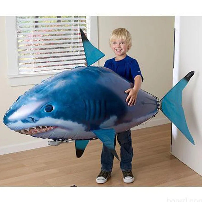 Large remote control shark inflatable balloon flying indoors with infrared controller.