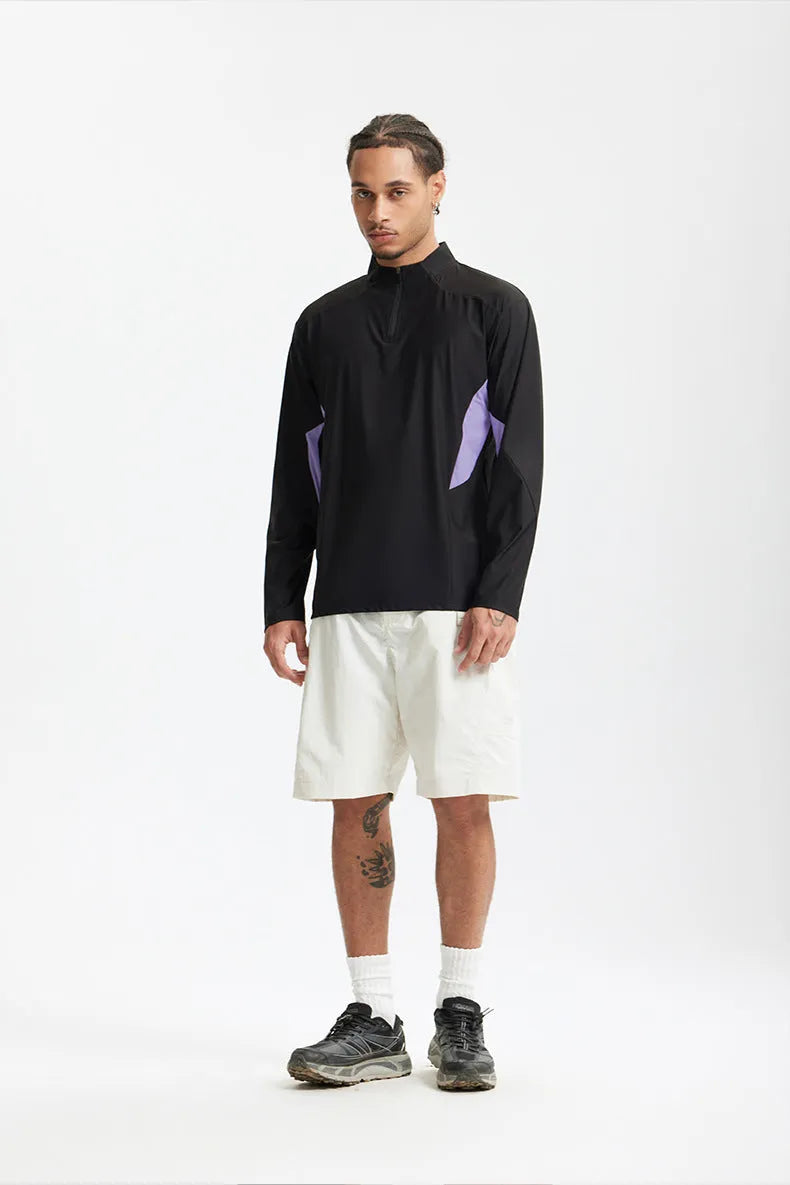 Men's solid colour lightweight polyester top in black, showing stitching detail on chest.
