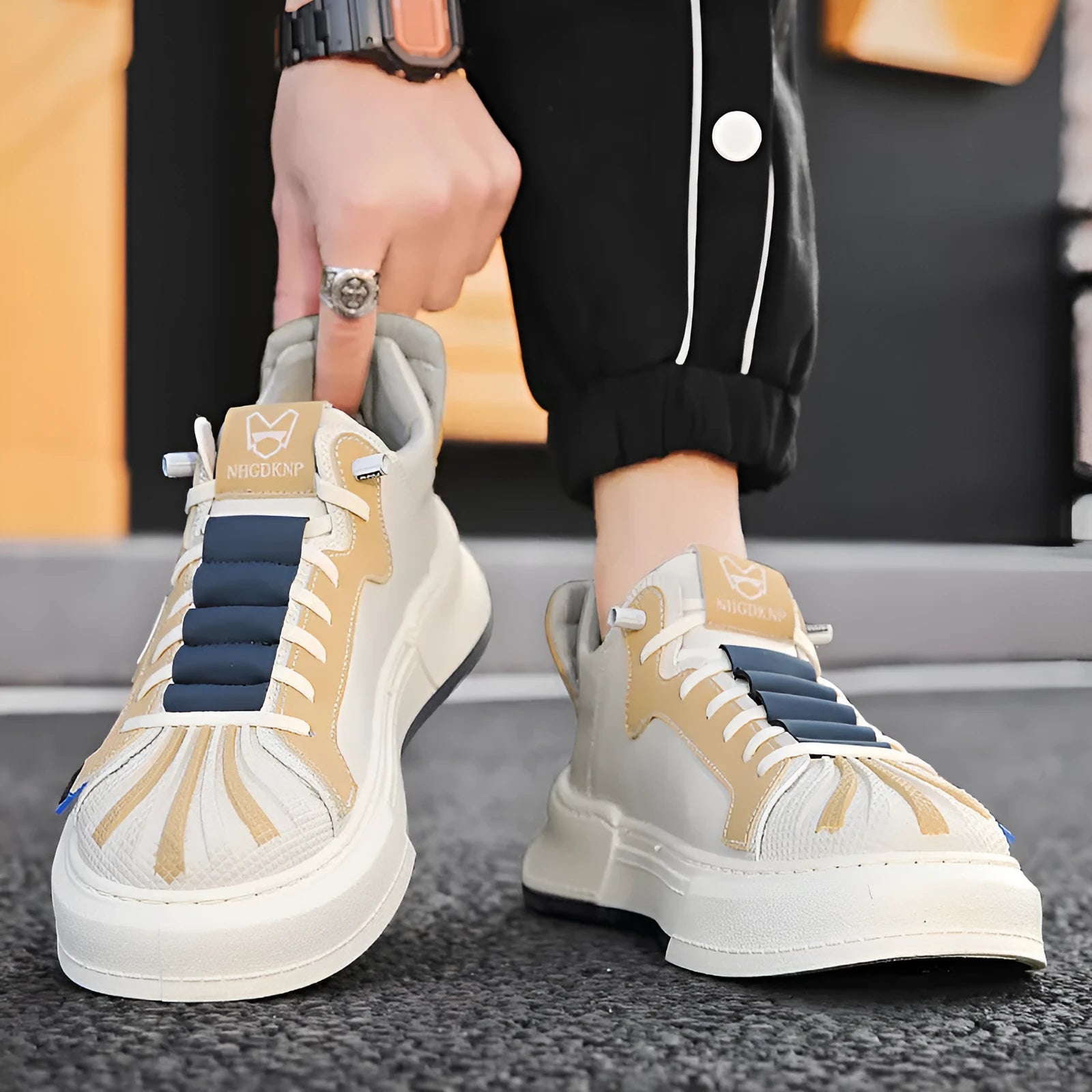 Men's beige casual sneakers with elastic band fastening and leather stitching detail